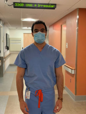 Dr. Akshay Kapoor is pictured here in the UMass Memorial Medical Center (Worcester, MA) in early April. He graduated early from medical school to staff a COVID-only ward to meet the demand of a potential physician shortage.
